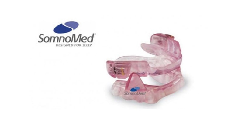 SomnoMed mouthguard sleep apnea treatment shown with logo